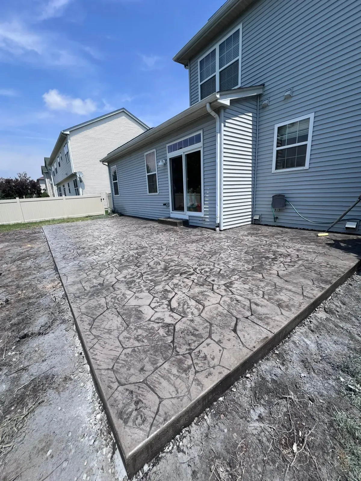 Stamped decorative concrete patio installed by Sammson Concrete, Chicagoland